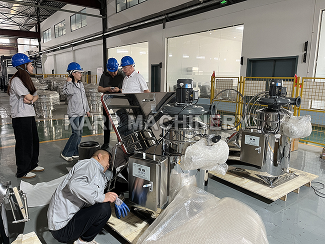 The customer is inspecting the small bag dumping stations